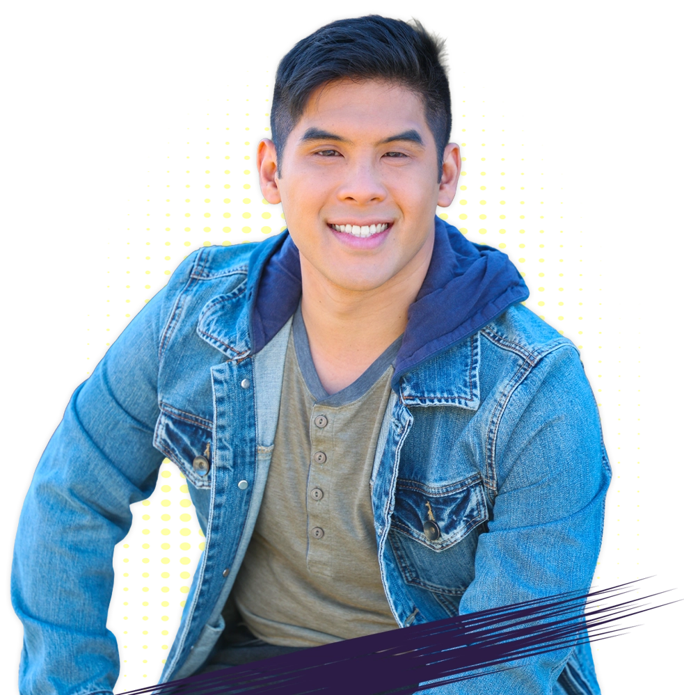 Headshot of John Hui smiling wearing a jean coat and casual t-shirt